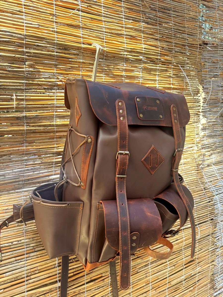 Handmade Full Leather Bushcraft & Travel Backpack with Axe Holder – 30L/40L/50L 99percenthandmade