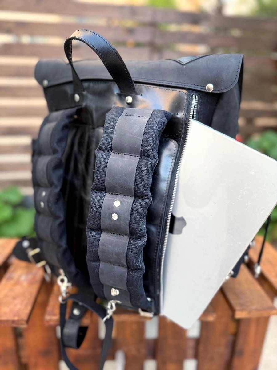backpack with two laptop compartments Sangro" Vintage Leather for Men 15.616 inch 2 C Beat the heat and the downpour by storing your water and umbrella in the side pockets McKlein Logan 17" Nylon, Two-Tone,