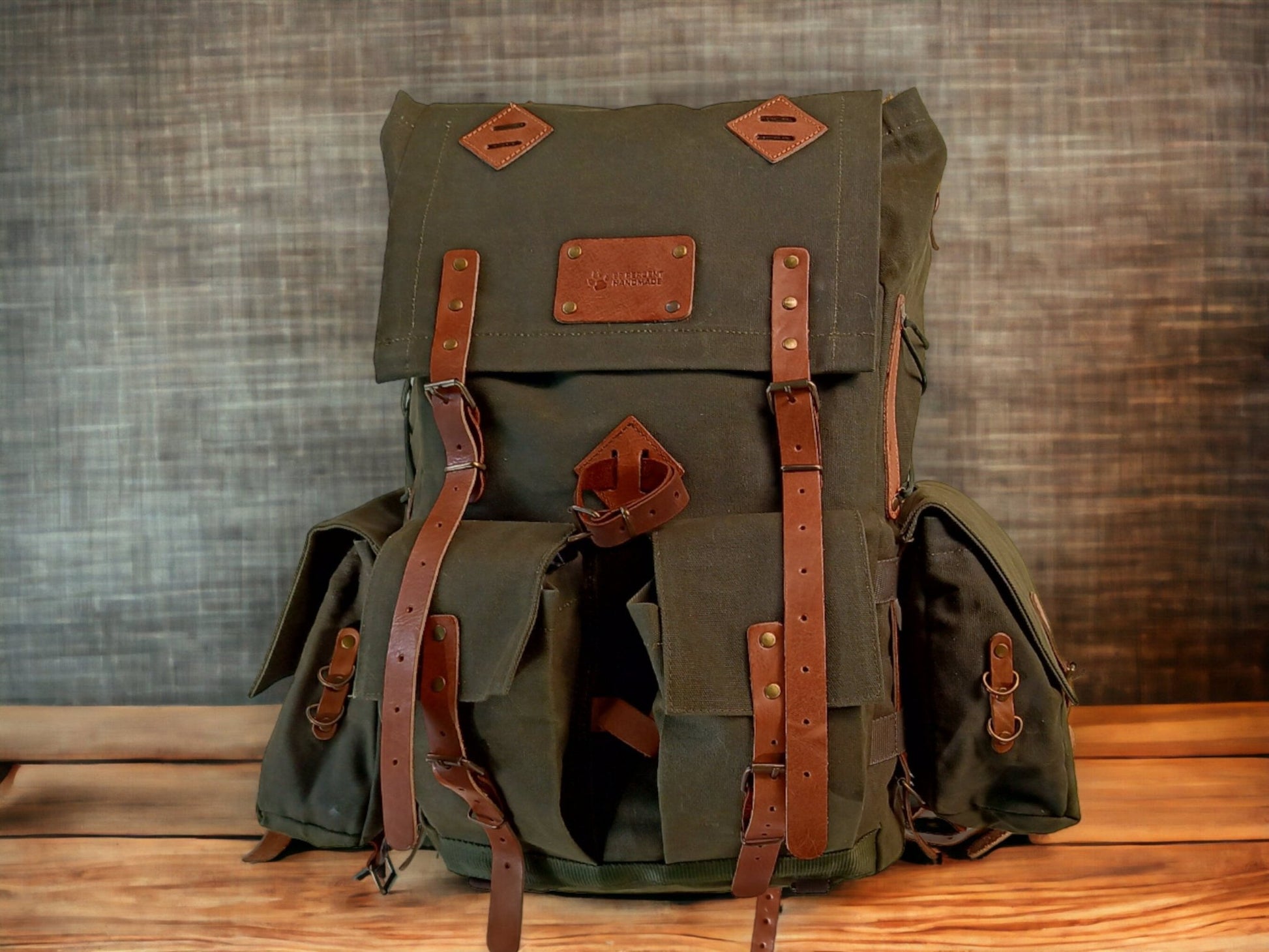 https://www.99percenthandmade.com/cdn/shop/products/waxed-canvas-leather-backpack-detachable-pouches-suitable-for-your-belt-50-l-daily-use-bushcraft-travel-camping-hunting-fishing-609305.jpg?v=1684549938&width=1946